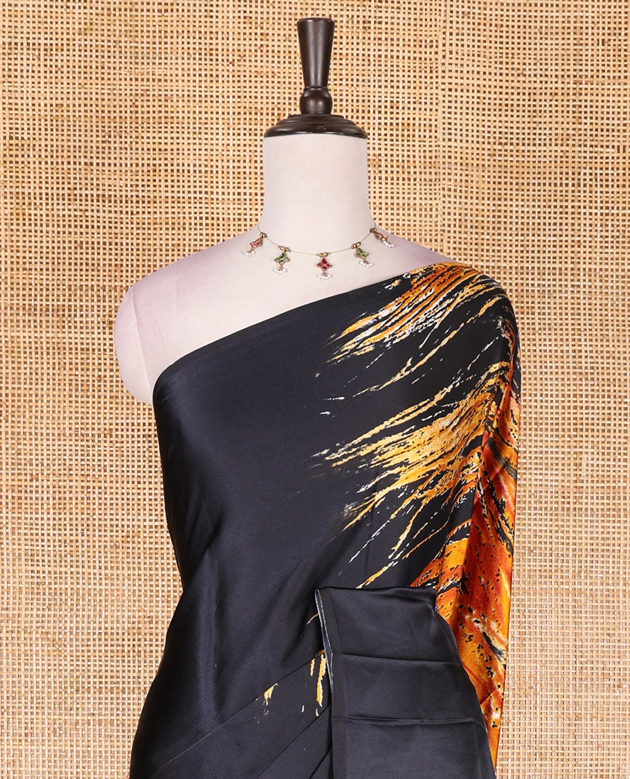 Borderless black and mustard peacock feather-like abstract printed satin crepe saree, peacock feather-like abstract print pallu, and abstract print blouse