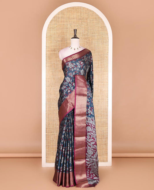 Navy blue kalamkari floral vine and peacock printed dola silk saree, contrast traditional zari border, peacock printed pallu, and floral vine print blouse