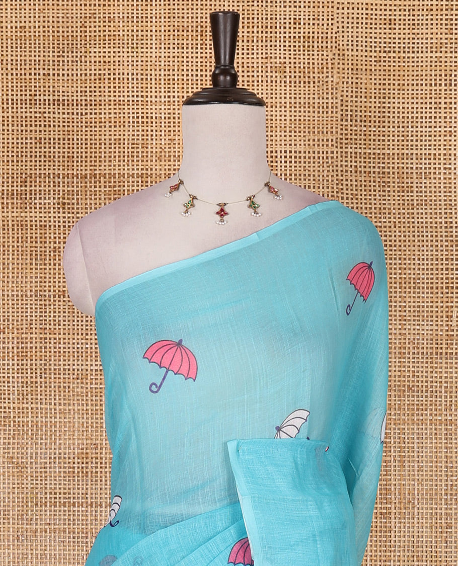 Borderless sky blue umbrella motifs printed linen cotton saree, self-pallu of big umbrella motifs and contrast blouse