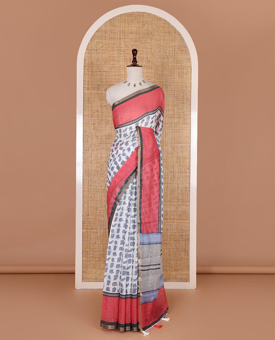 White cute elephant motifs printed linen cotton saree, contrast chevron border, pallu of stripes and chevron, and contrast printed blouse