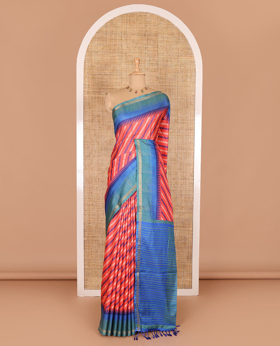 Tomato pink leheriya stripes printed katan silk saree, contrast zari piping temple border, temple pallu, and a contrast square buttas printed blouse