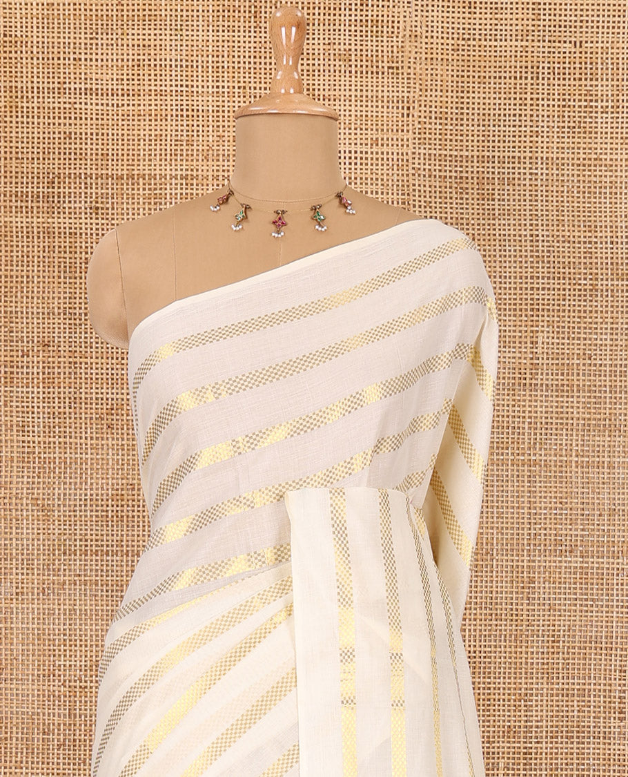 Borderless cream and maroon horizontal zari muthu striped Kerala cotton saree, self-pallu with tassels and a matching blouse