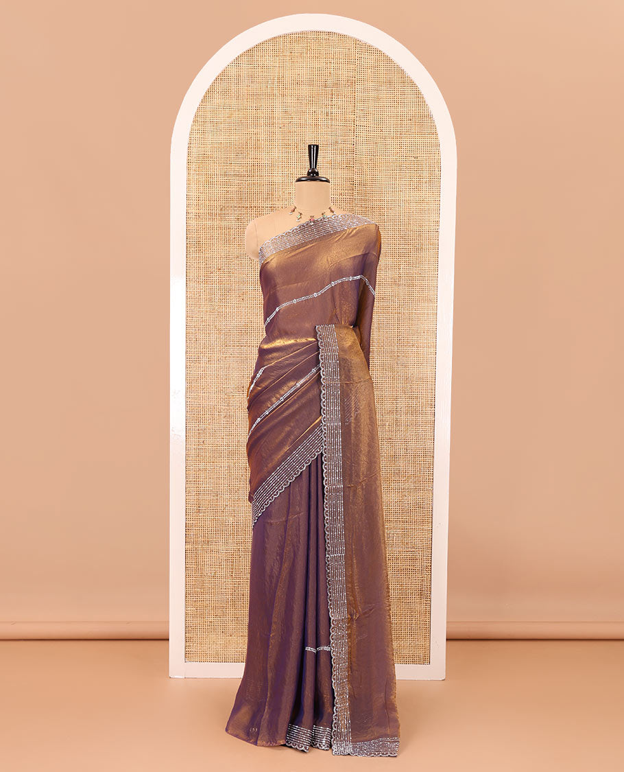 Copper horizontally swarovski stone striped fendi chiffon saree, swarovski stone work border, and a plain blouse