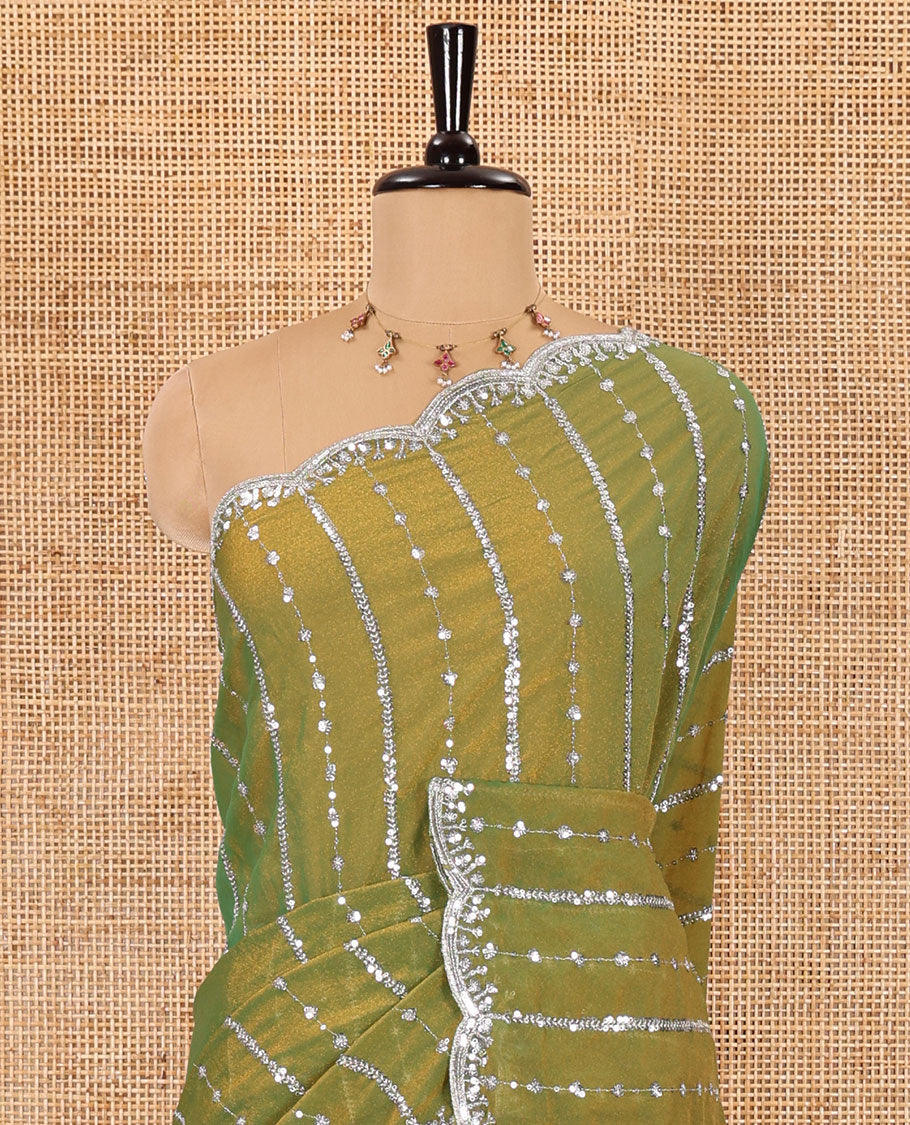 Parrot green vertical stripes embroidered shimmer chiffon saree, scallop embroidered border, embroidered pallu, and fancy embroidered matching blouse