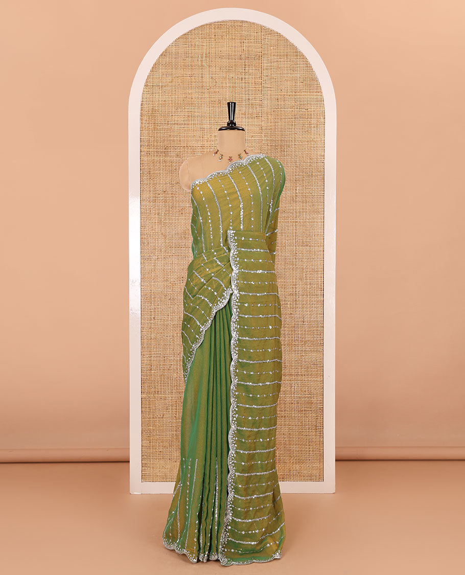 Parrot green vertical stripes embroidered shimmer chiffon saree, scallop embroidered border, embroidered pallu, and fancy embroidered matching blouse