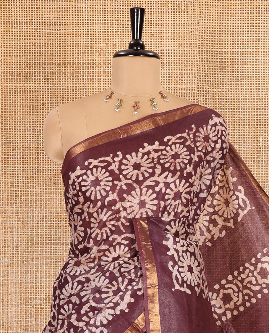 Wine floral design batik-printed Bhagalpur cotton saree, zari piping border, batik-printed pallu, and a plain blouse