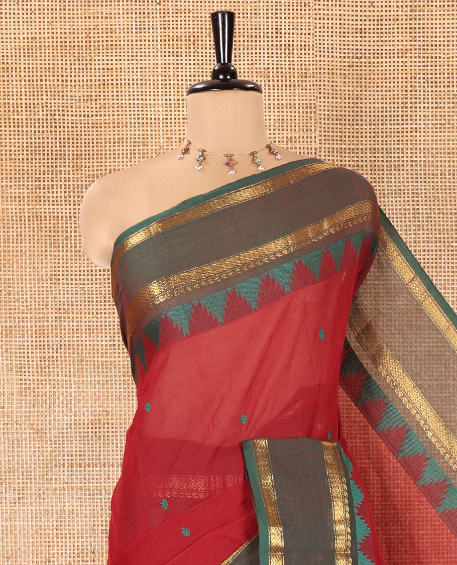 Maroon Chettinad Cotton Saree, Subtly Sparkled with Thread Buttas All Over Its Body, Complemented by a Contrast Border Rettai Pettu Border of Paisley and Chevron Stripes, Subtly Designed Pallu, and Paired with a Matching Blouse