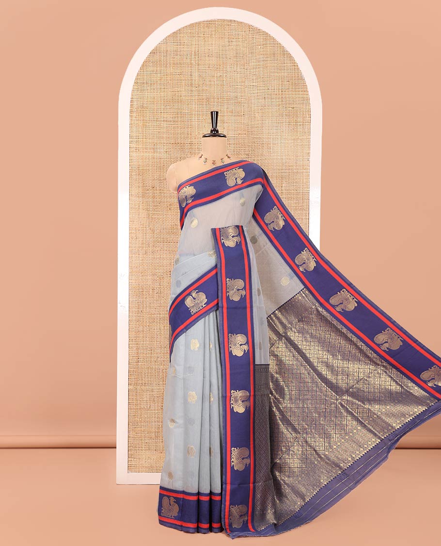 Grey Chanderi Cotton Saree, Woven with Zari Buttas All Over Its Body, Complemented by Contrast Border of Peacock Designs, Grand Jaal Pallu, and Paired with a Matching Blouse