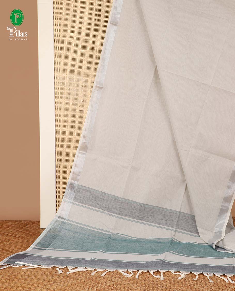 Light pista green linen mix cotton saree with silver zari border & contrast pallu along with contrast blouse