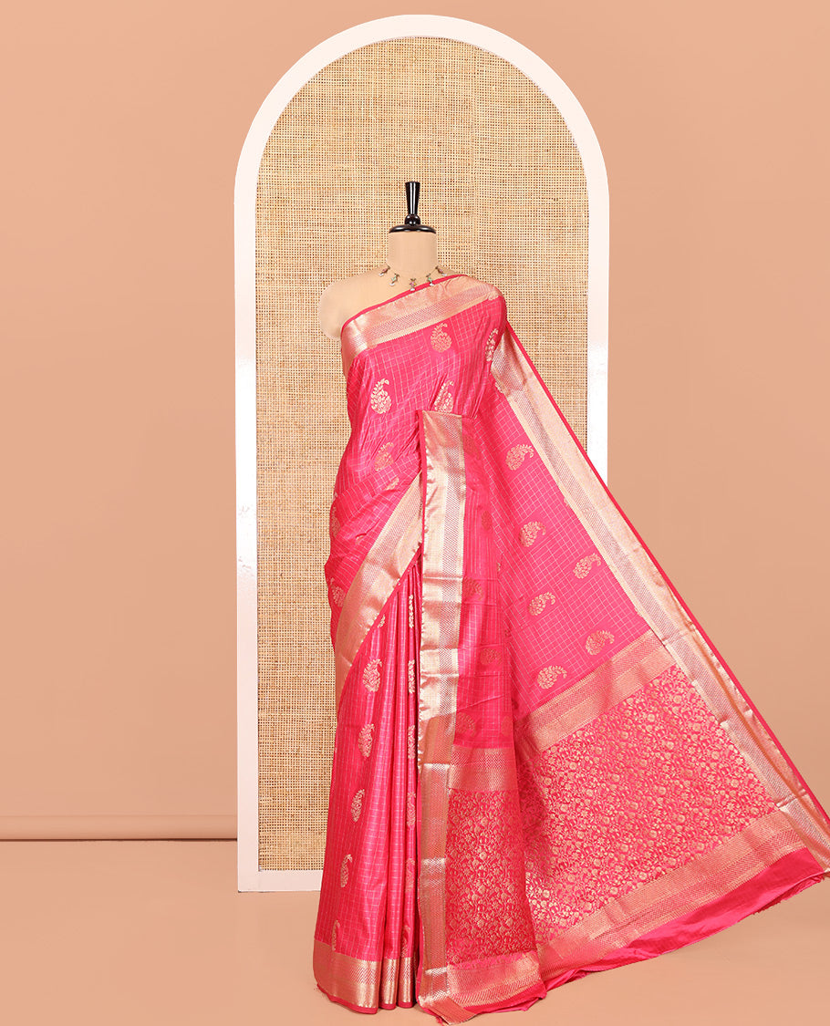Rani Pink Satin Silk Saree, Enriched with Paisleys and Zari Checked Design on Its Body, Highlighted by Zari Traditional Design Border, Floral Jaal Pallu, and Paired with a Matching Blouse