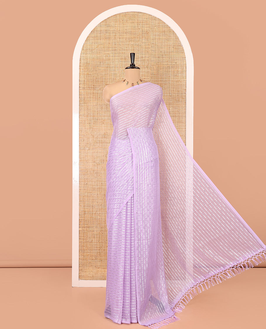 Borderless Lavender Chiffon Saree, Gleamed Up with Horizontal Stripes on Its Body, a Self-Pallu, and Has No Blouse