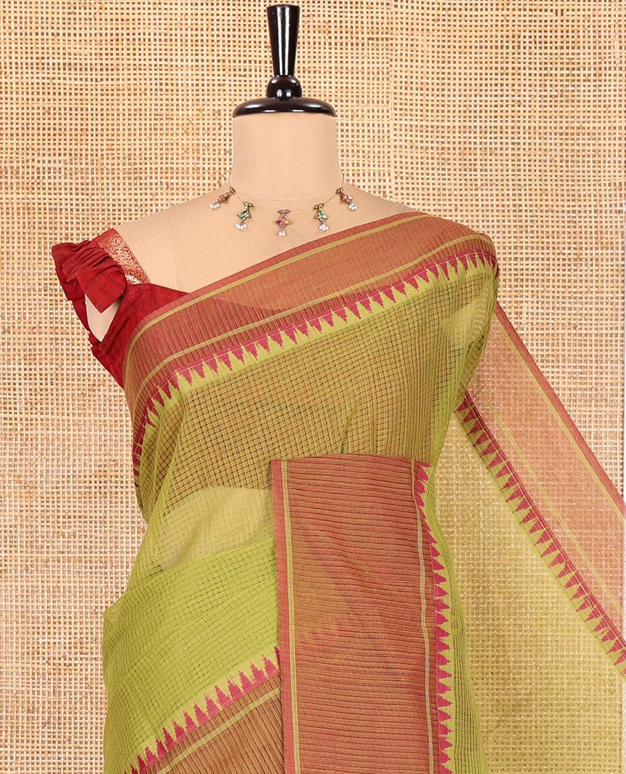Green Kota Chex Saree with Sparse Checks, Complemented by a Contrast Temple Border, Striped Pallu, and a Contrast Blouse