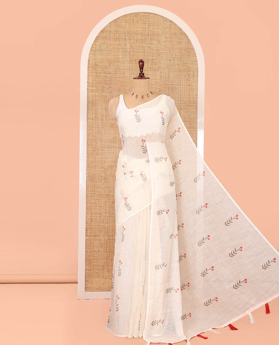 Borderless Cream-Pink Linen Cotton Saree, Prettified with Floral Buttas, a Self-Pallu, and a Contrast Blouse