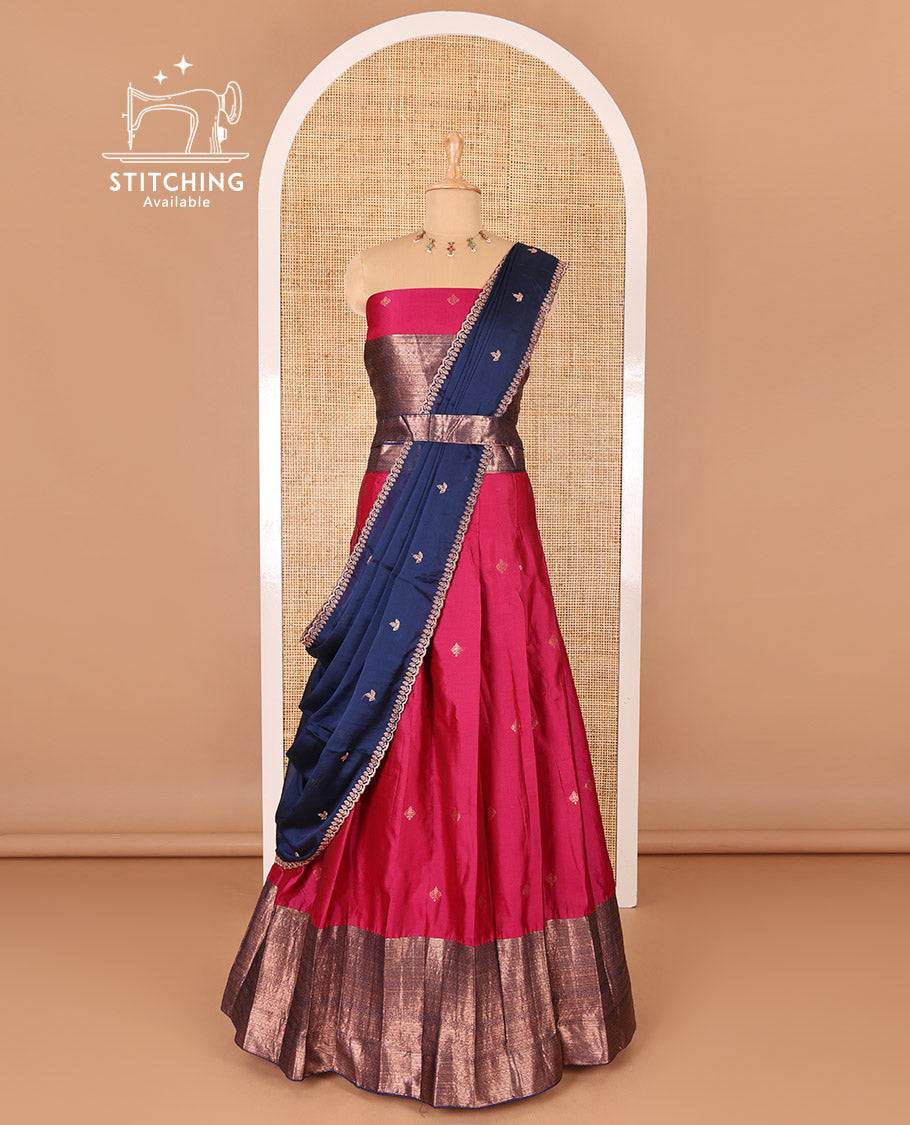 Rani pink taffeta silk half-saree, zari buttas and contrast traditional zari bordered skirt, a matching taffeta silk blouse, and contrast embroidered satin georgette dhavani