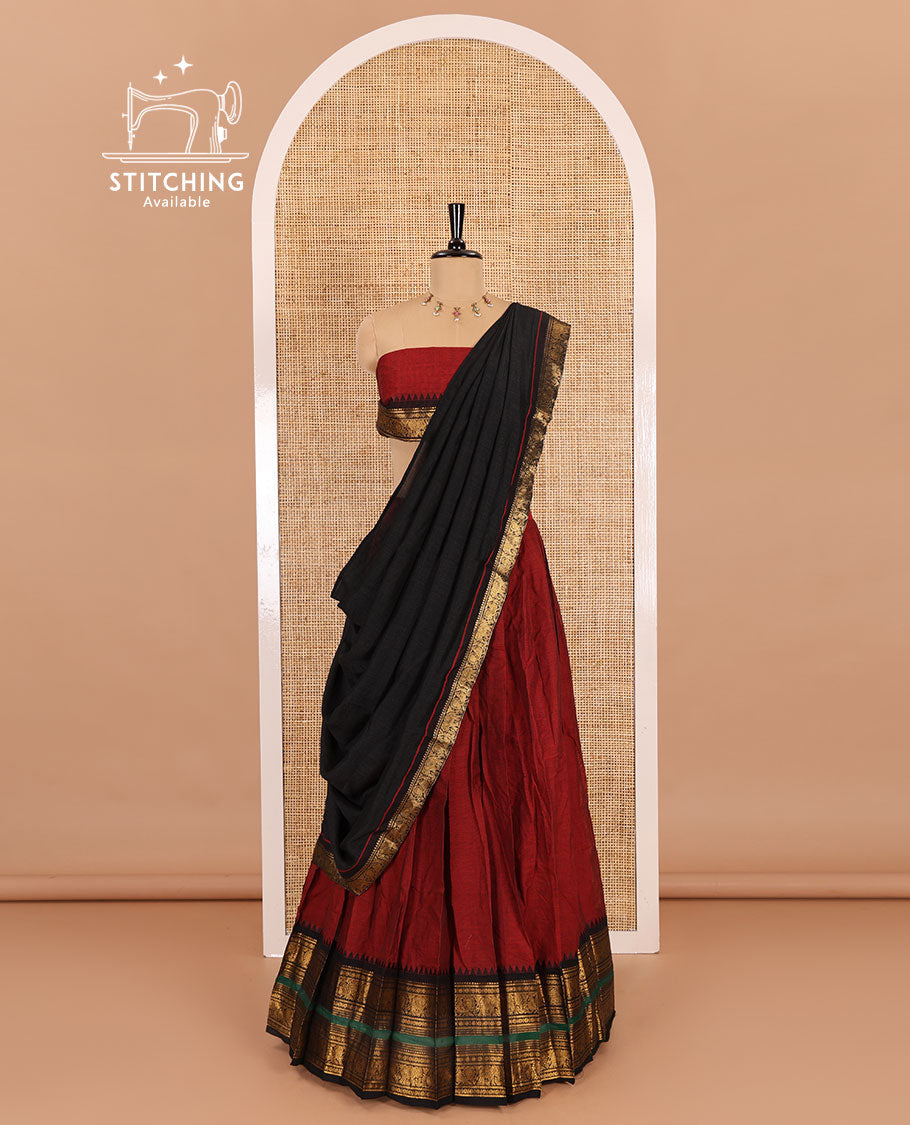 Maroon-black sungudi cotton half-saree, plain with contrast traditional zari varisai pettu bordered skirt, a matching blouse, and a zari bordered dhavani