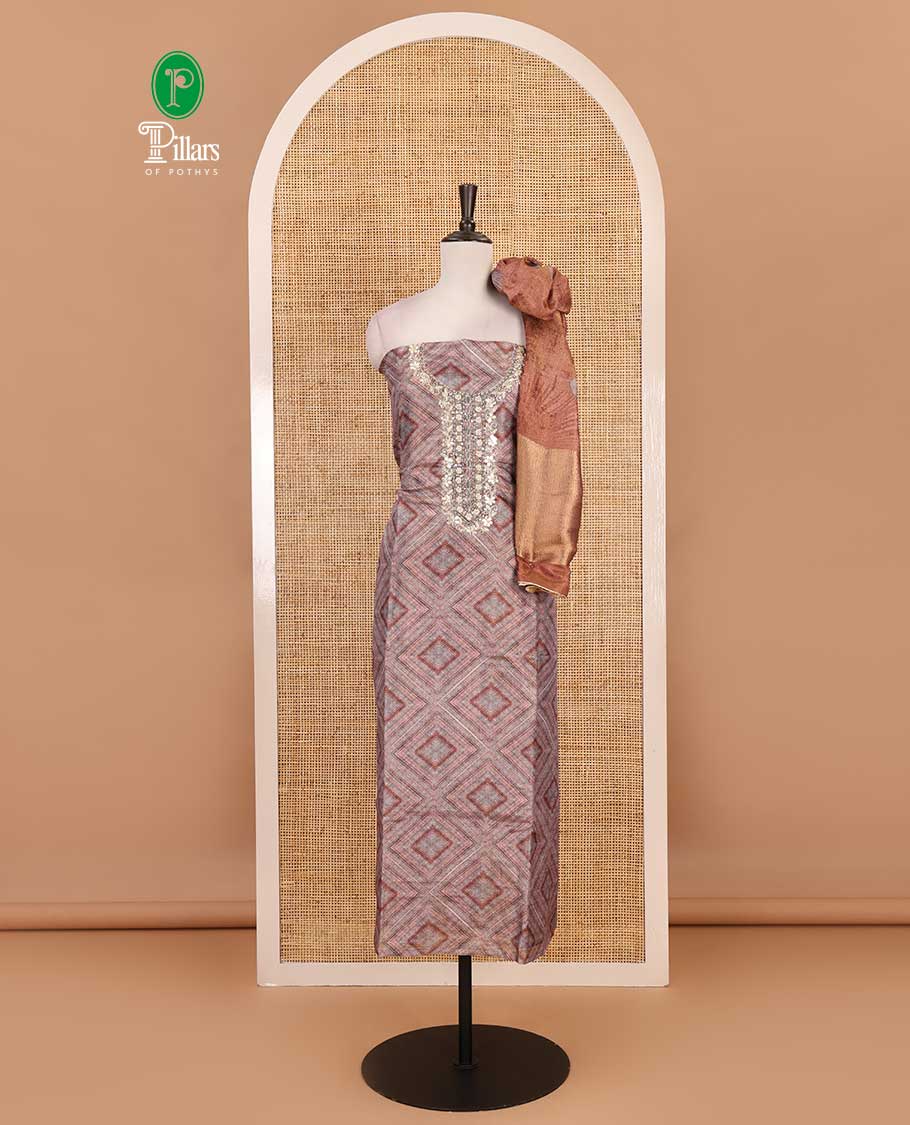 Grey and rust material chudidar set, geometric digital printed with neck embroidered Shimmer tissue top, santoon bottom, and floral printed Shimmer tissue dupatta