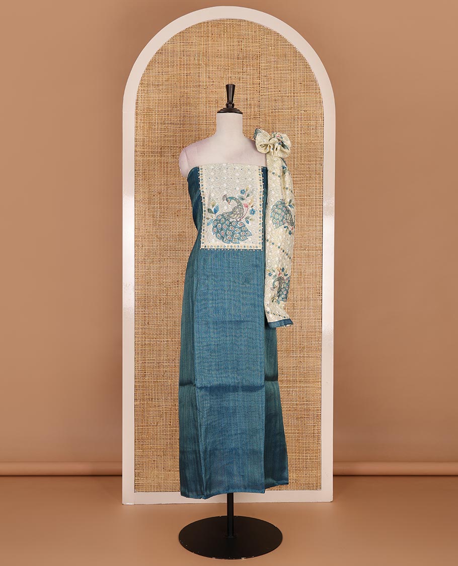 Green tissue material chudidar set, peacock printed with neck patch embroidered top, plain bottom, dupatta of peacock print, and cut work