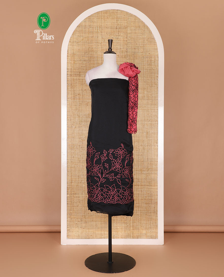 Black and rani pink organza material churidar set, Lucknowi chikankari floral vine embroidery top, plain bottom, and contrast floral embroidery dupatta