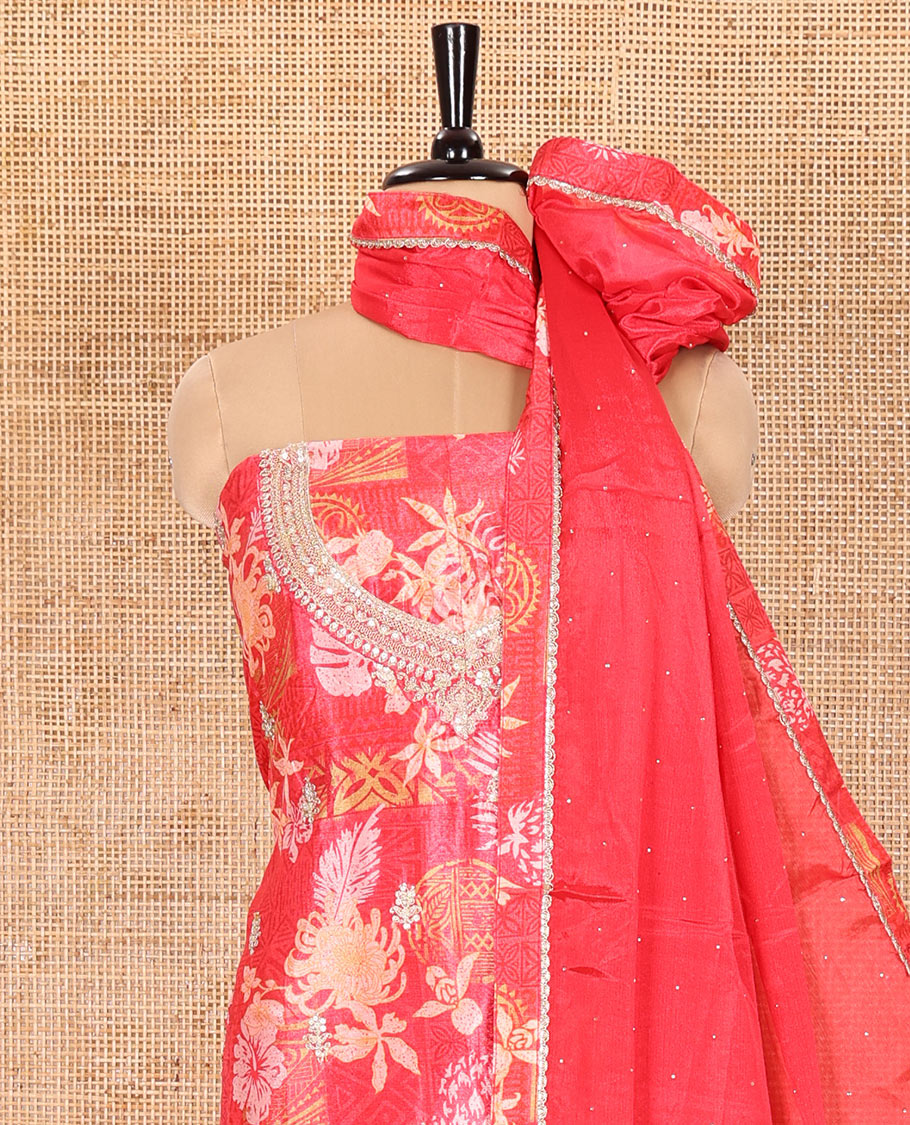 Tomato Pink Material Chudidar Set Decked Up with Floral-Geometric Printed with Neck Embroidered Chinon Top, Subtly Made Plain Santoon Bottom, and a Chinon Dupatta Featuring Printed Border, and Glitter Dots