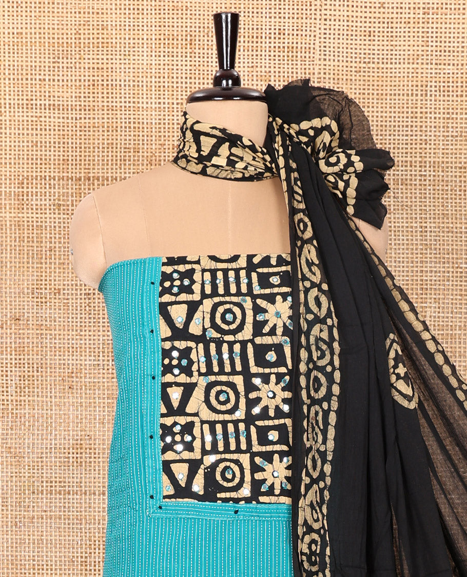 Blue Material Chudidar Set Elevated with Kantha Embroidery, Batik Print, and Mirror Work on the Cotton Top, Comes with a Batik Geometric Patterns Printed Bottom, and a Cotton Batik Geometric Printed Dupatta