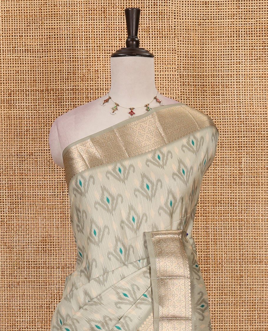 Pista green pochampally ikkat style motifs fancy tussar saree, traditional zari border, zari rich intricate pallu, and matching blouse