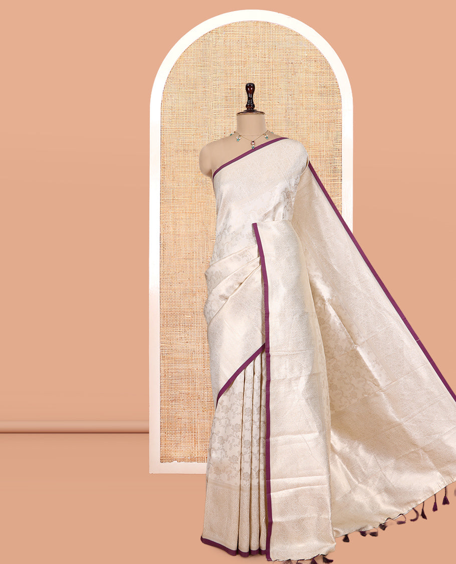 Off-White-Purple Semi-Silk Saree, Adorned with Floral Jacquard Design, a Zari Paisley Border, and a Contrast Blouse