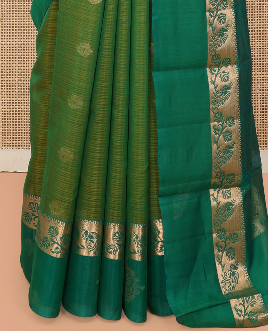 Green Silk Cotton Saree, Ornamented with Zari Buttas, a Contrast Floral Creeper Border, Jaal Pallu, and a Contrast Blouse
