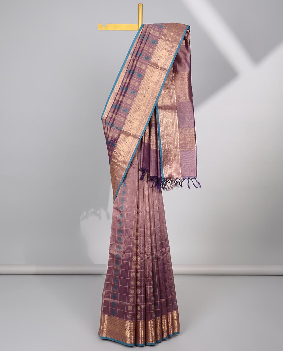 Mauve motifs enclosed with checked cotton silk saree with contrast striped border & zari floral design pallu