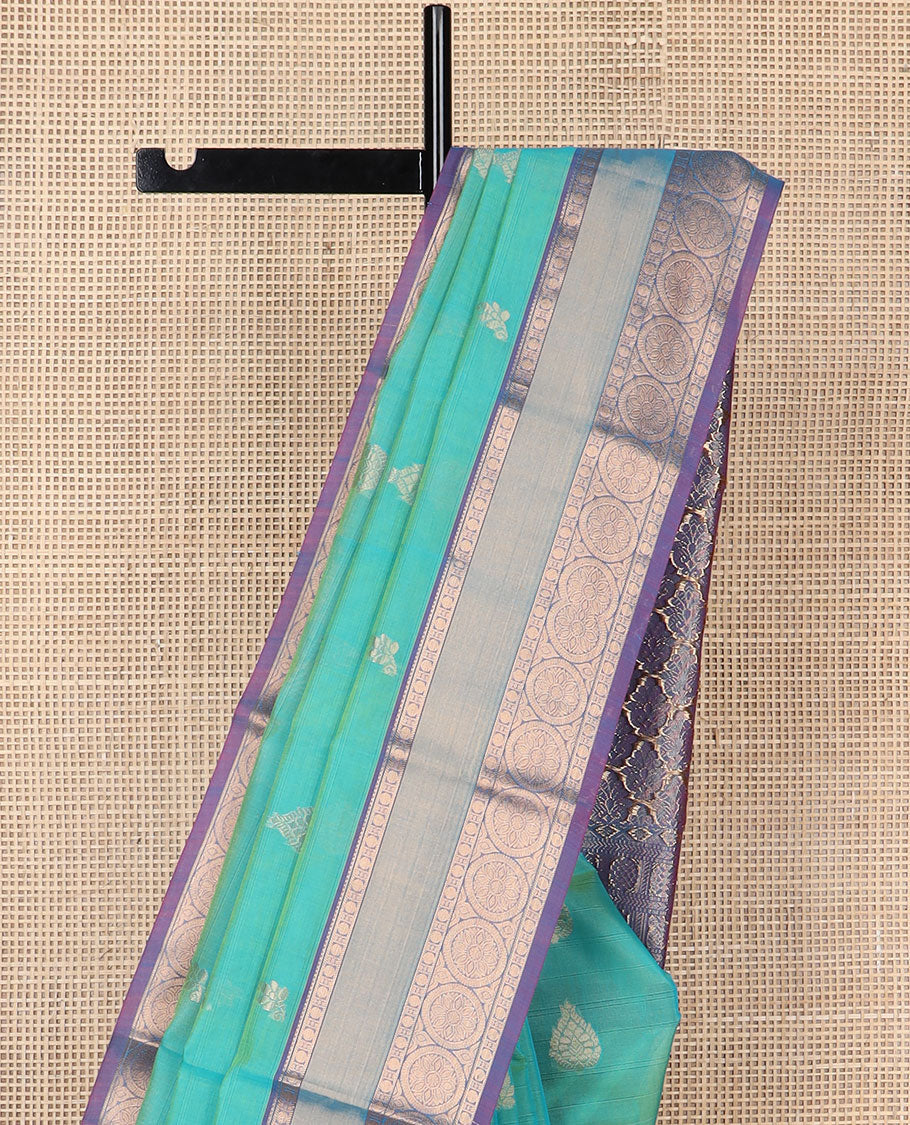 Sea green motifs silk cotton saree with contrast zari design border & ogee design pallu