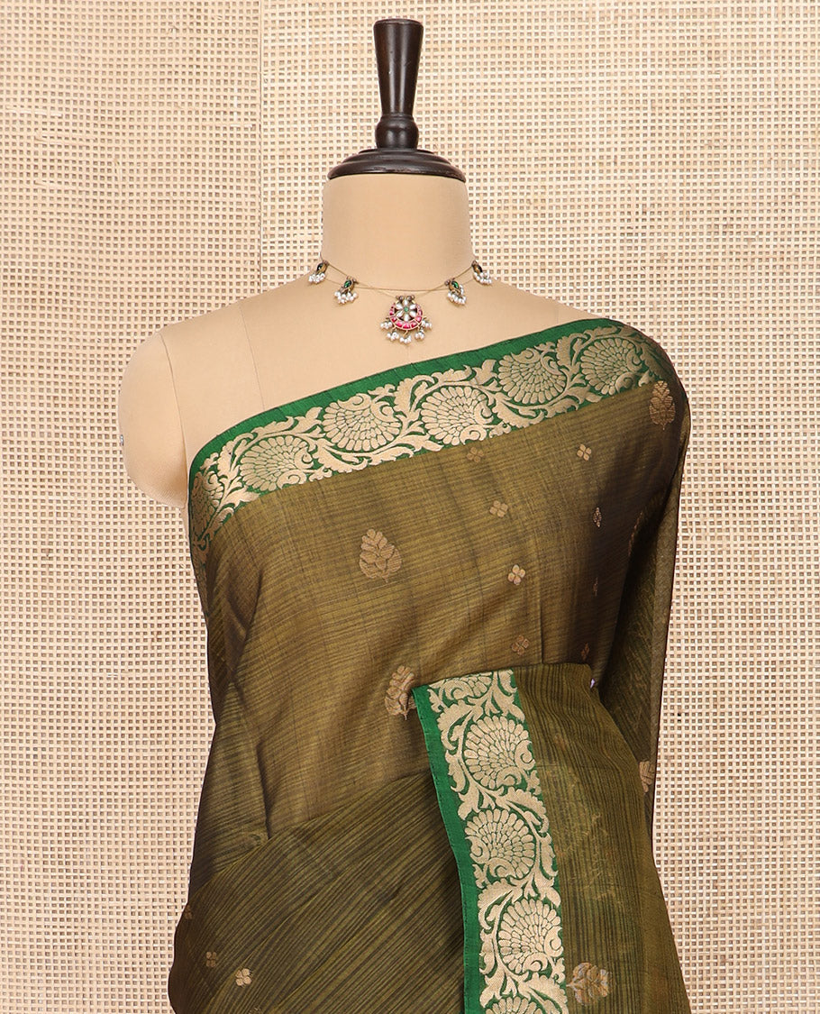 Green Silk Cotton Saree Embellished with Buttas All Over the Body, Complemented by a Contrast Floral Creeper Zari Border, Featuring a Contrast Pallu of Floral Zari Designs, and Paired with a Contrast Blouse
