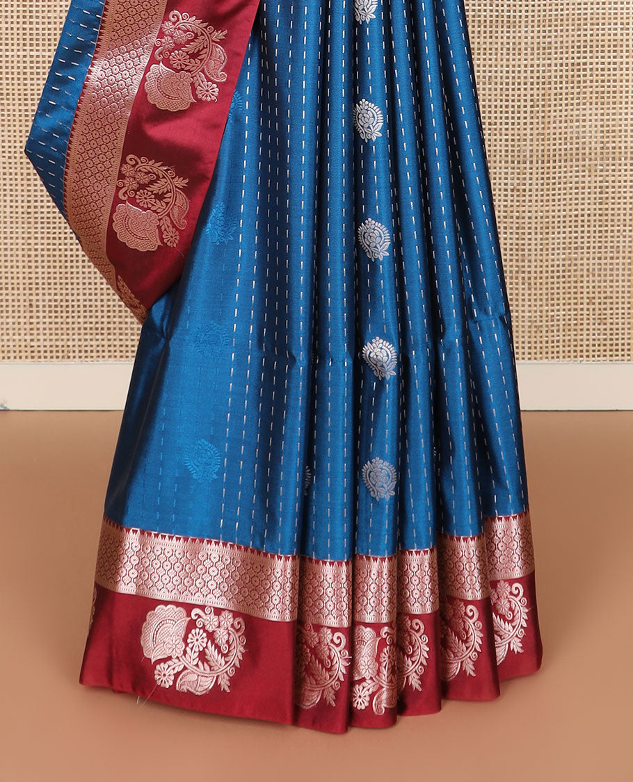 Blue zari buttas soft silk saree, contrast traditional design zari border, and pallu of traditional designs