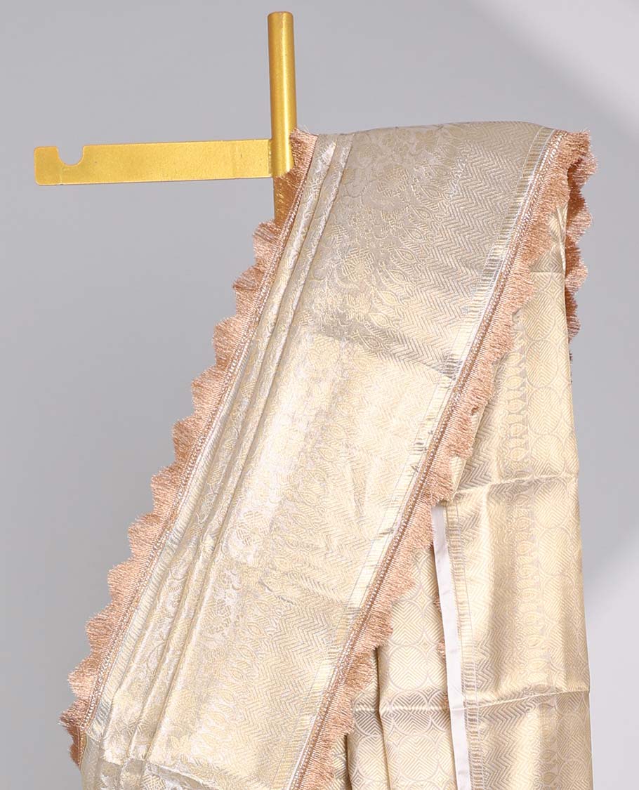 Cream floral jacqaurd tissue saree with self zari design & intricate zari design pallu