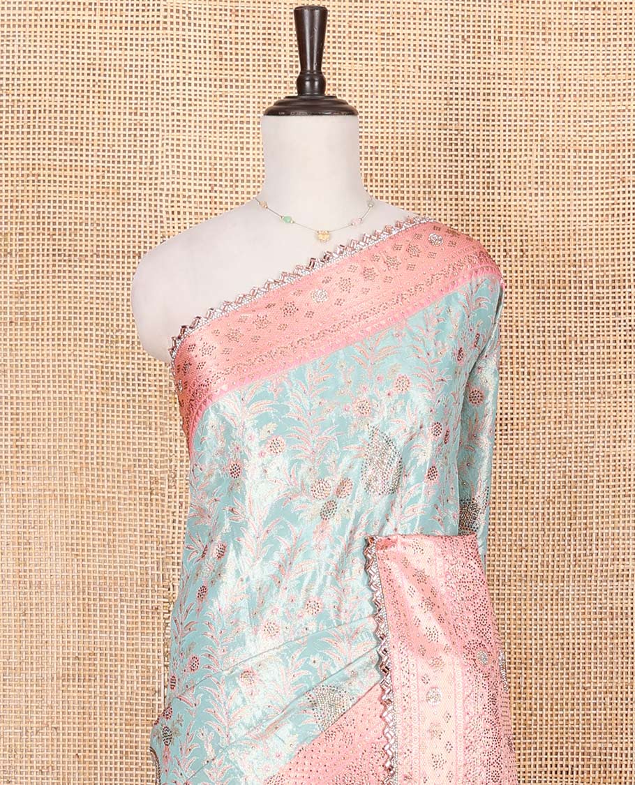 Blue Vastrakala Silk Saree Elegantly Highlighted with Floral Jacquard and Stone Work, Complemented by Contrast Traditional Zari and Stone Embroidered Scallop Border, Mughal-Style Zari Woven Stone Work Pallu, and Paired with Contrast Stone Work Blouse