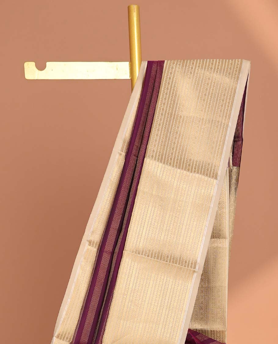 Maroon striped vasundhara elite silk saree with contrast striped zari design border & intricate zari design pallu