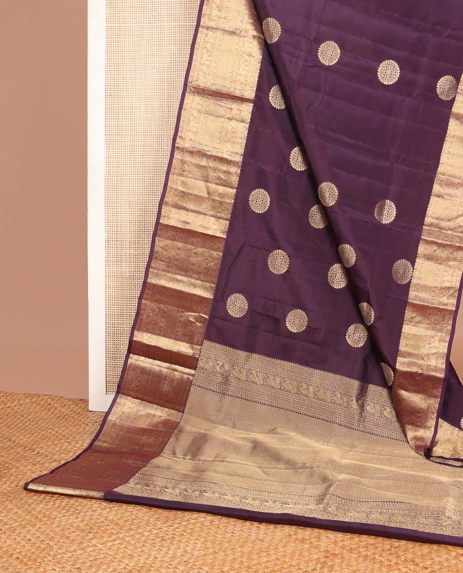 Maroon chakram buttas Vasundhara silk mix saree, zari border of thilakam mokku,kamalam,rettai neli,annam,yaanai & mayil kann designs & mayil kann pallu