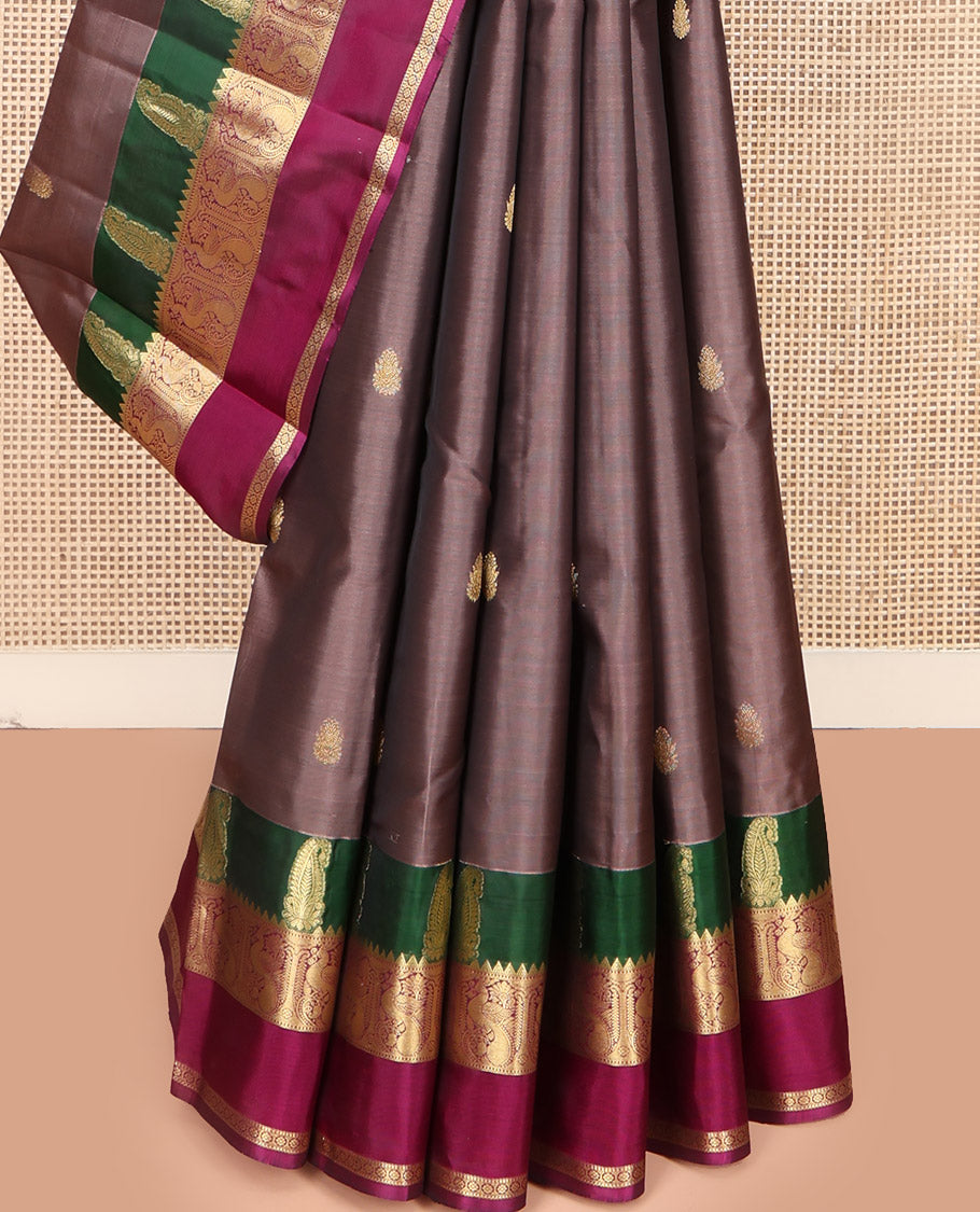 Brown Vasundhara Lite Silk Mix Saree, Graced with Zari Buttas All Over Its Body, Complemented by a Contrast Rettai Pettu Border of Manga, Rekku, Mayil, and Kamalam Designs, Grandly Woven Pallu, and Paired with a Contrast Blouse