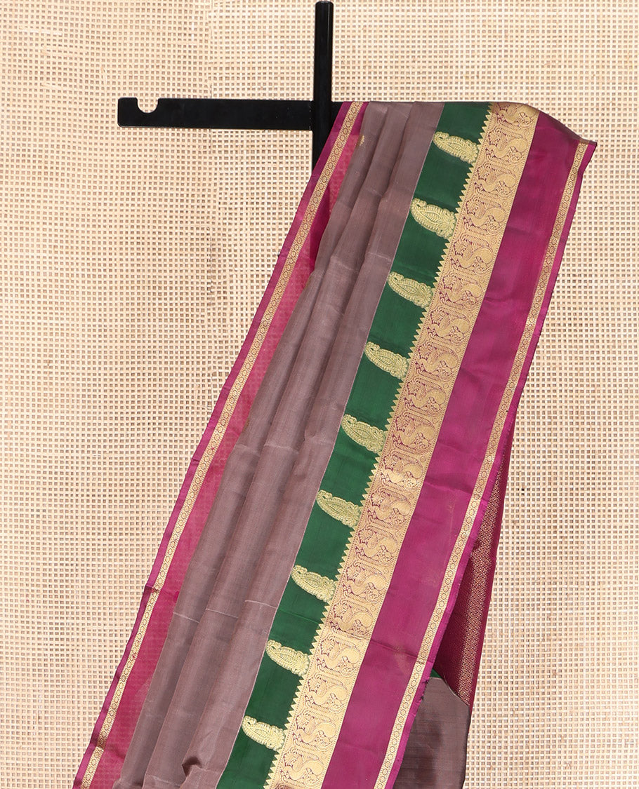 Brown Vasundhara Lite Silk Mix Saree, Graced with Zari Buttas All Over Its Body, Complemented by a Contrast Rettai Pettu Border of Manga, Rekku, Mayil, and Kamalam Designs, Grandly Woven Pallu, and Paired with a Contrast Blouse