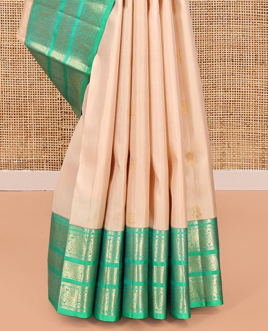 Sandal Vasundhara Silk Saree, Woven with Zari Buttas All Over Its Body, Complemented by a Contrast Border of Jada Nagam, and Kodi Visiry Designs, Intricately Designed Pallu, and Paired with a Contrast Blouse