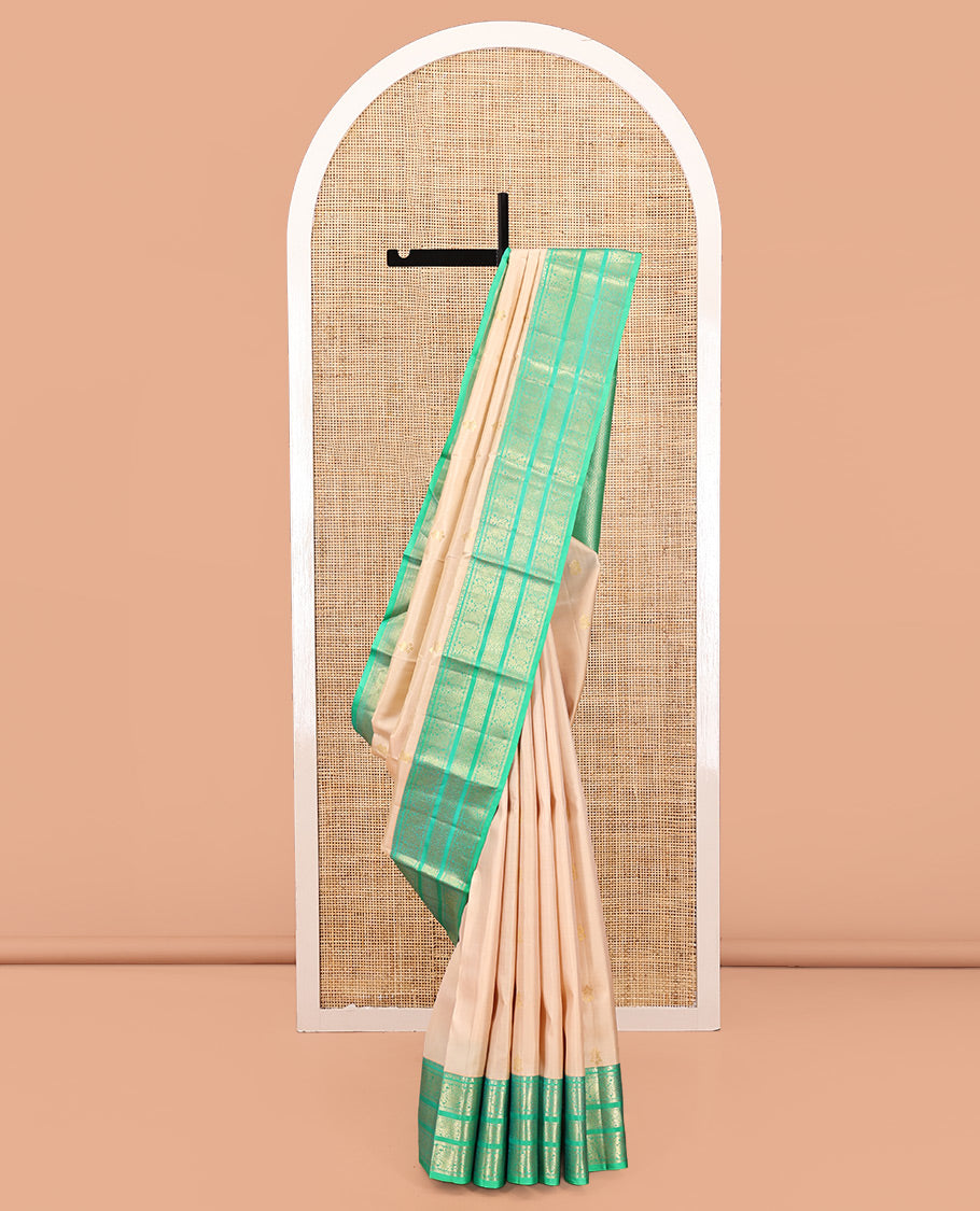 Sandal Vasundhara Silk Saree, Woven with Zari Buttas All Over Its Body, Complemented by a Contrast Border of Jada Nagam, and Kodi Visiry Designs, Intricately Designed Pallu, and Paired with a Contrast Blouse