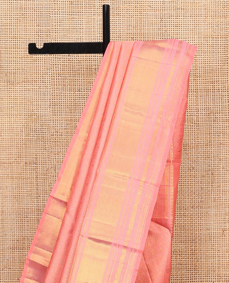Pink Kanchipuram Wedding Silk Saree, Detailed with Jacquard Design on Its Body, Highlighted by Zari Border of Thilakam Mokku, Muthu, Mayil Kann, Yaanai, and Chakram Designs, Pallu of Mayil Kann Designs, and Paired with a Matching Blouse