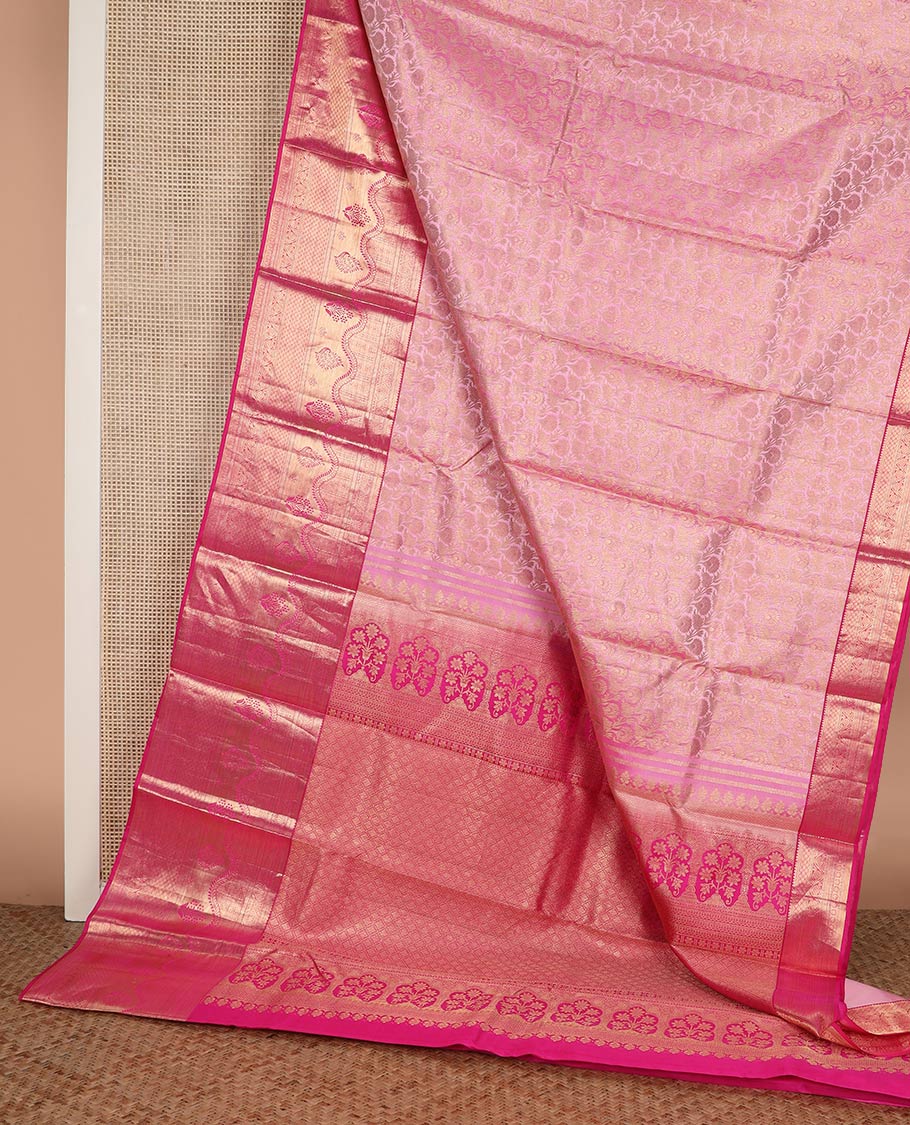 Pink floral jaal jacquard Kanchipuram wedding silk saree, contrast border steeped with traditional zari designs, and zari-rich jaal pallu