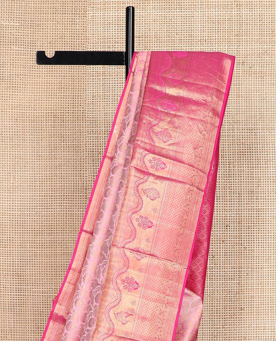 Pink floral jaal jacquard Kanchipuram wedding silk saree, contrast border steeped with traditional zari designs, and zari-rich jaal pallu