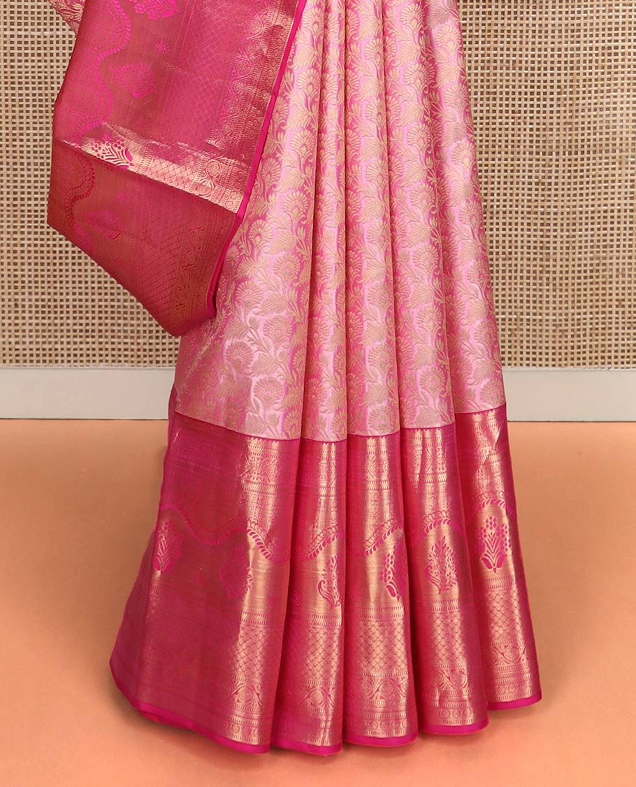 Pink floral jaal jacquard Kanchipuram wedding silk saree, contrast border steeped with traditional zari designs, and zari-rich jaal pallu