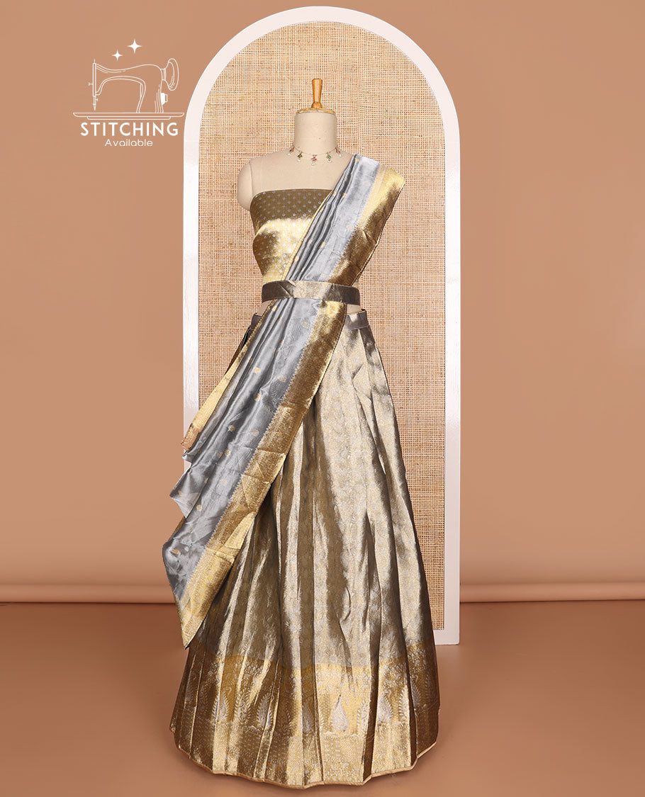 Grey buttas tissue half saree with contrast zari design border, checked zari design blouse & floral design dhavani