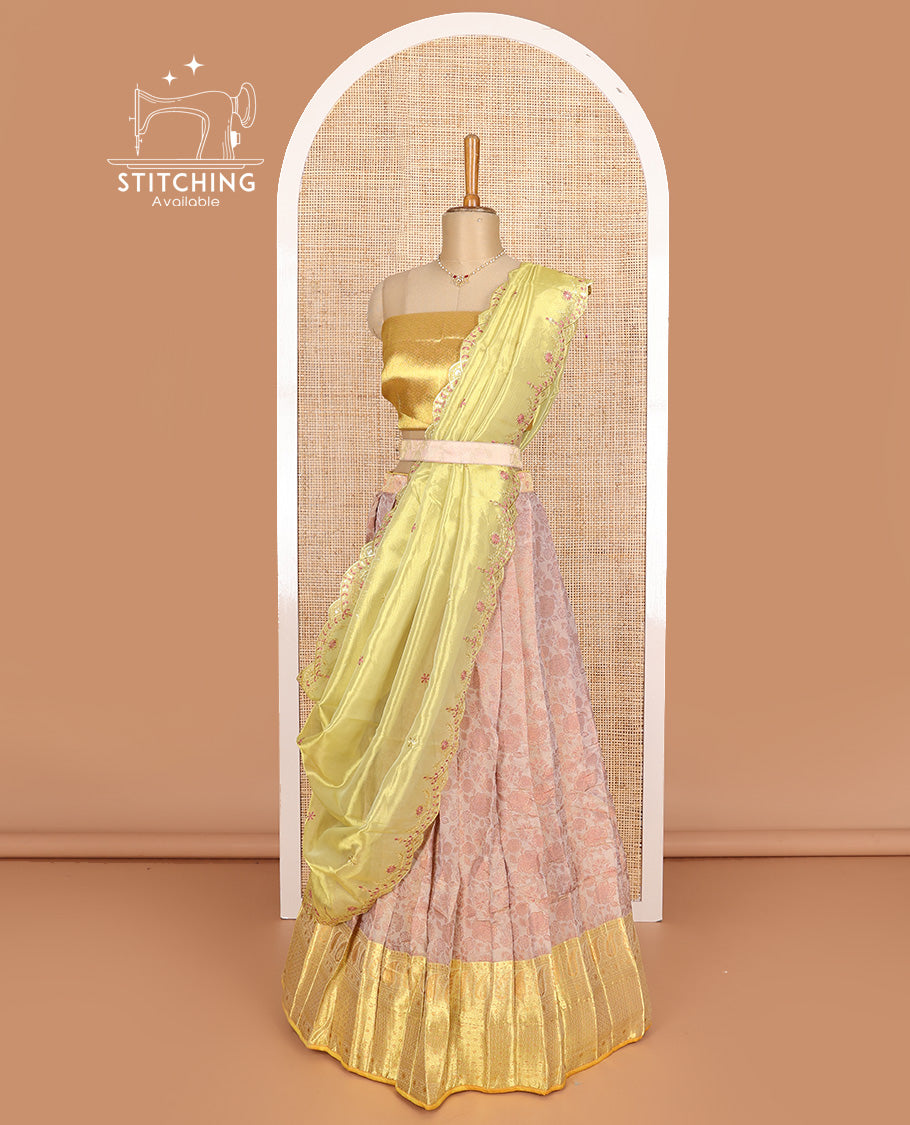 Pastel pink art silk half-saree, floral vine with contrast traditional border skirt, brocade blouse, scallop embroidered dhavani, and detachable belt