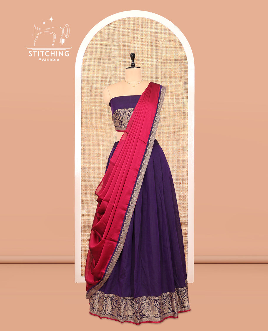 Violet Cotton Half-Saree Features Plain Skirt, a Contrast Dancing Human Figurines Border, a Matching Blouse, and a Contrast Dhavani