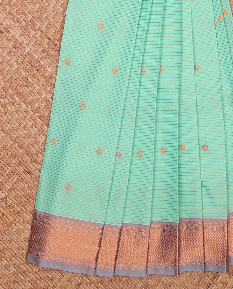 Turquoise zari buttas and striped gift saree, contrast traditional zari design woven border, and jaal pallu