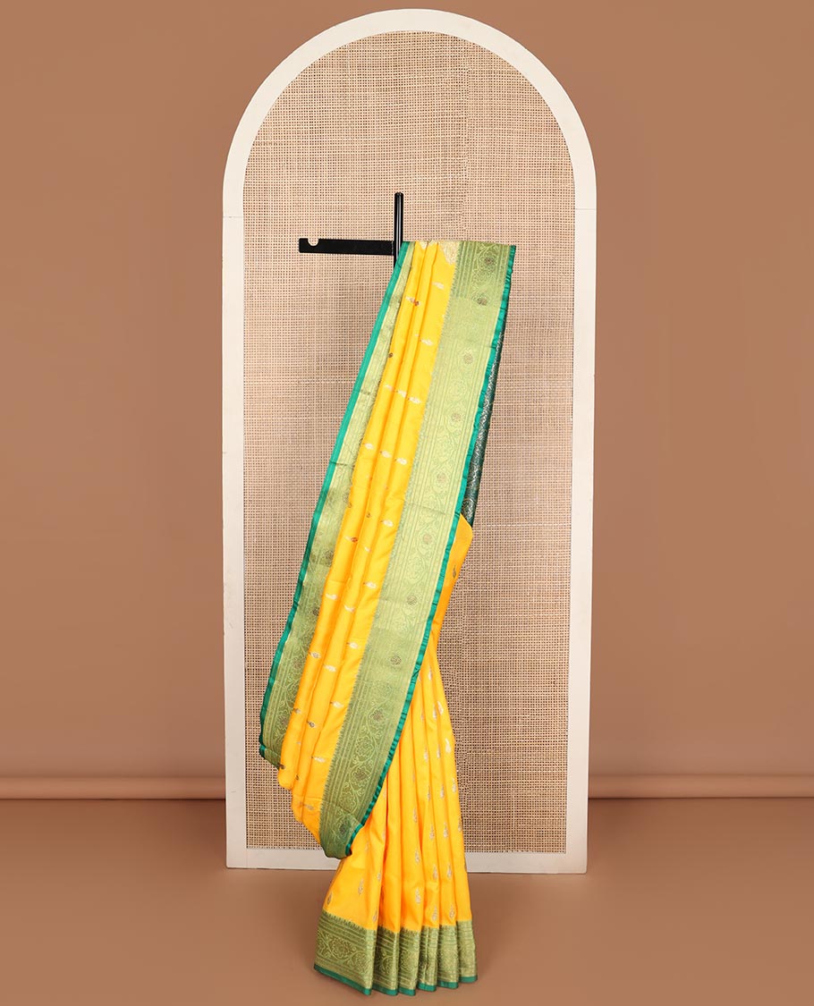 Orange buttas semi banaras nylon with contrast floral design border & floral jaal design pallu
