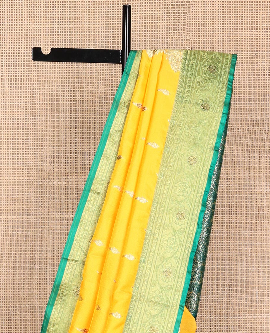 Orange buttas semi banaras nylon with contrast floral design border & floral jaal design pallu