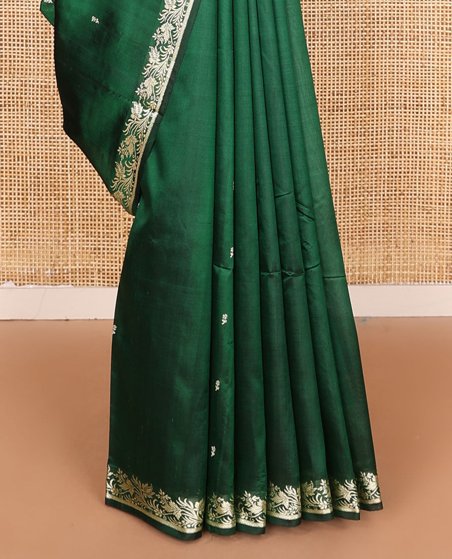 Dark green buttas kathan silk saree, floral creeper border, and Mughal-style floral jaal pallu